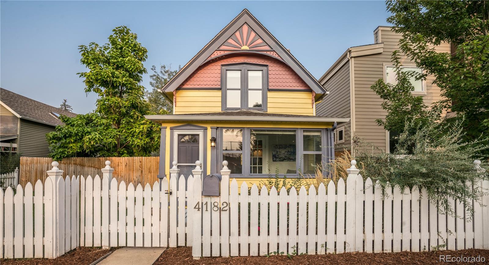 a front view of a house with a porch