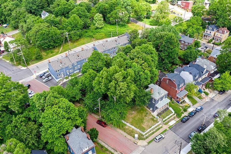 an aerial view of a house with a garden