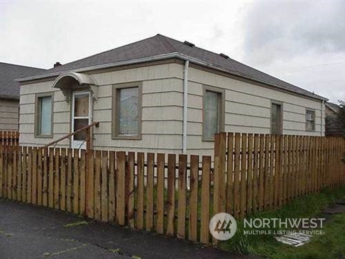 front view of a house with a small yard