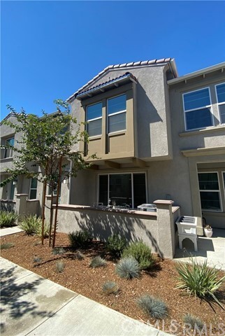 a front view of a house with balcony