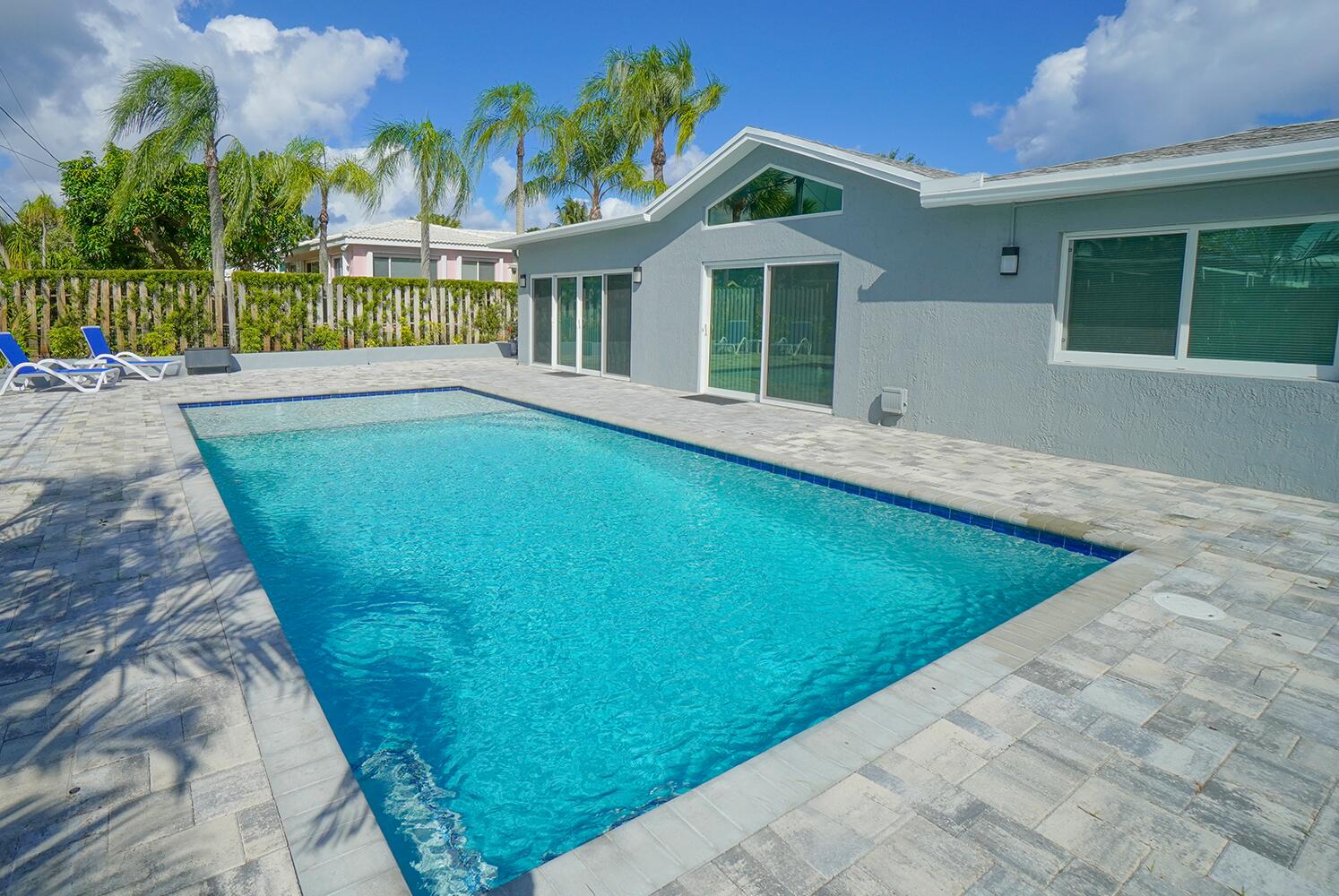 a view of a house with a swimming pool