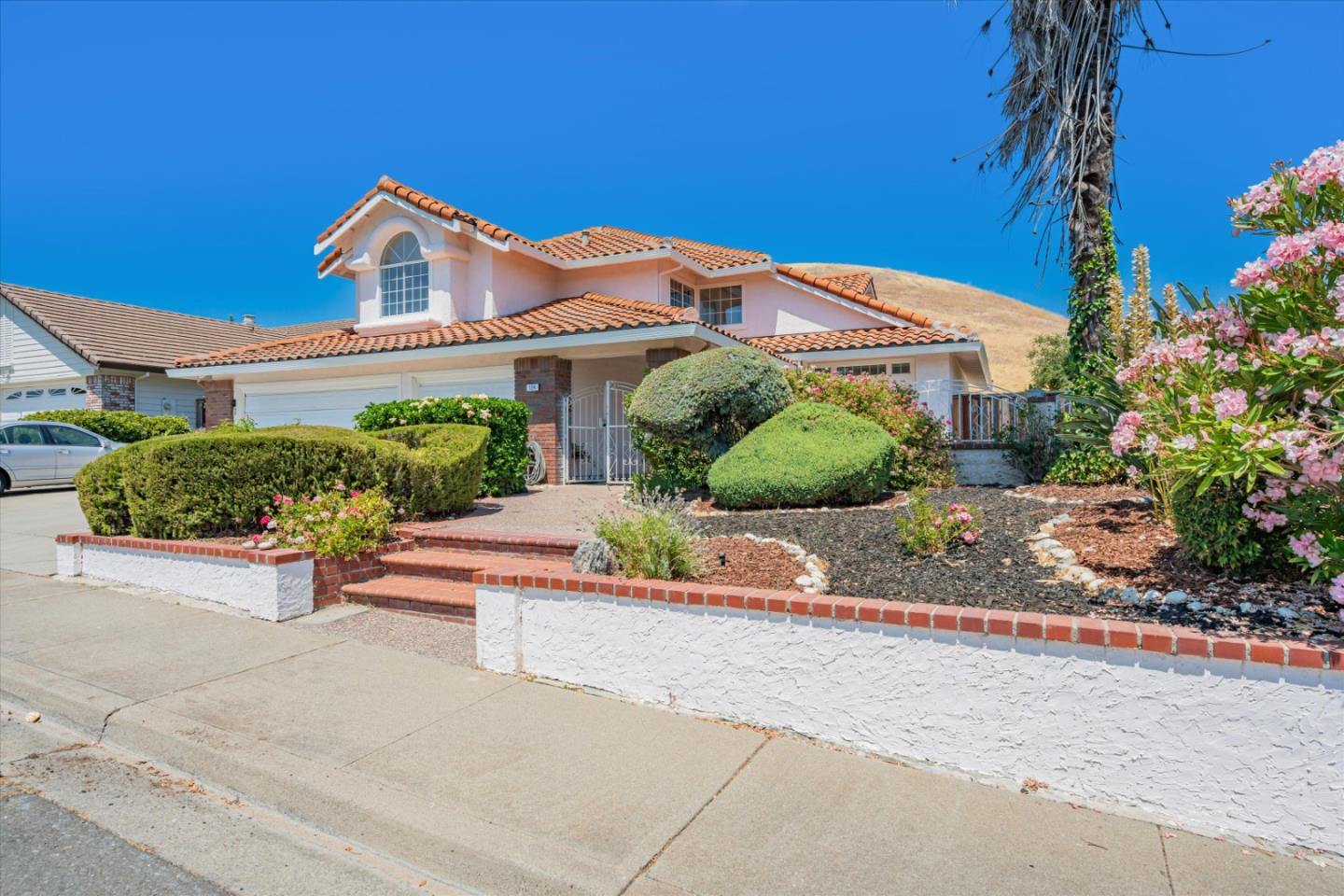 front view of a house with a small yard