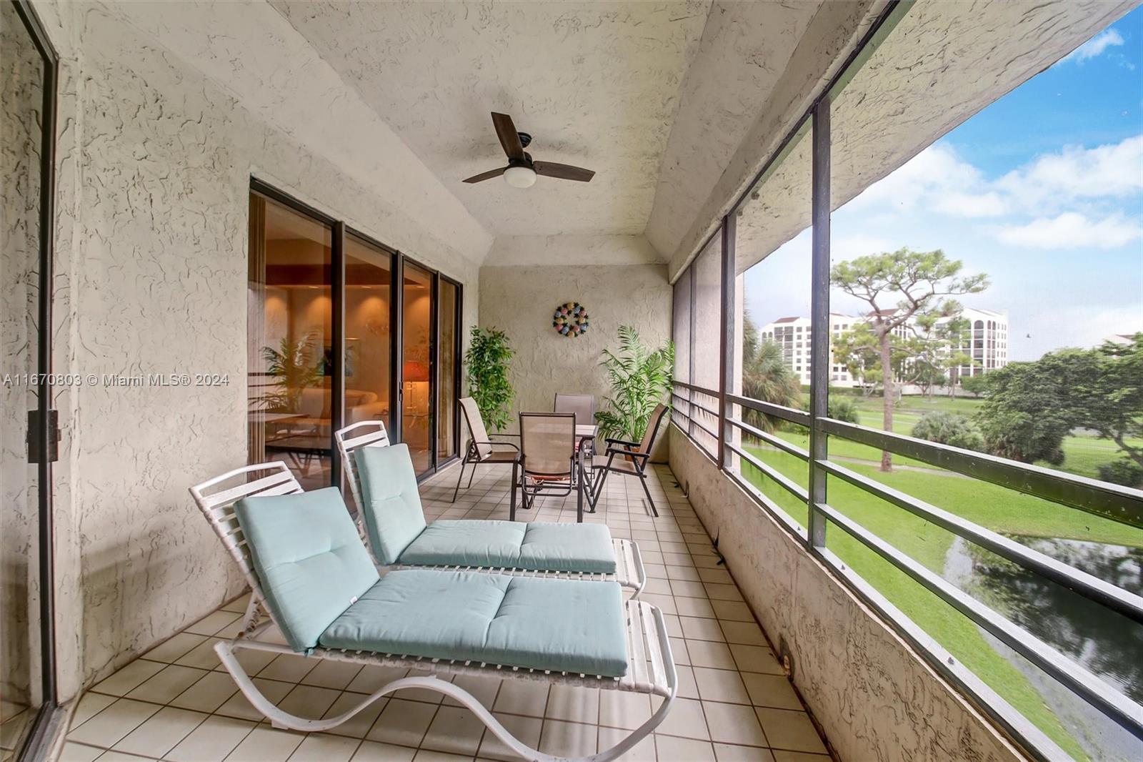 a view of a balcony with chairs