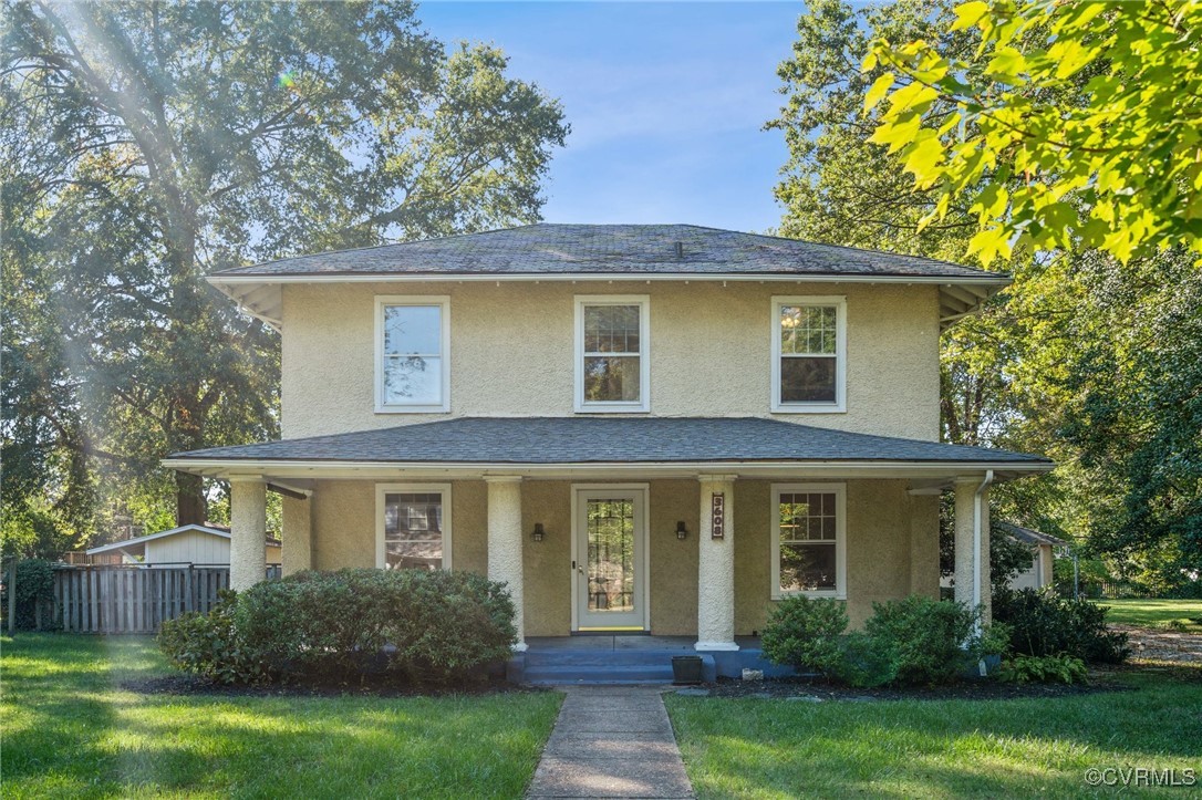 front view of a house with a yard