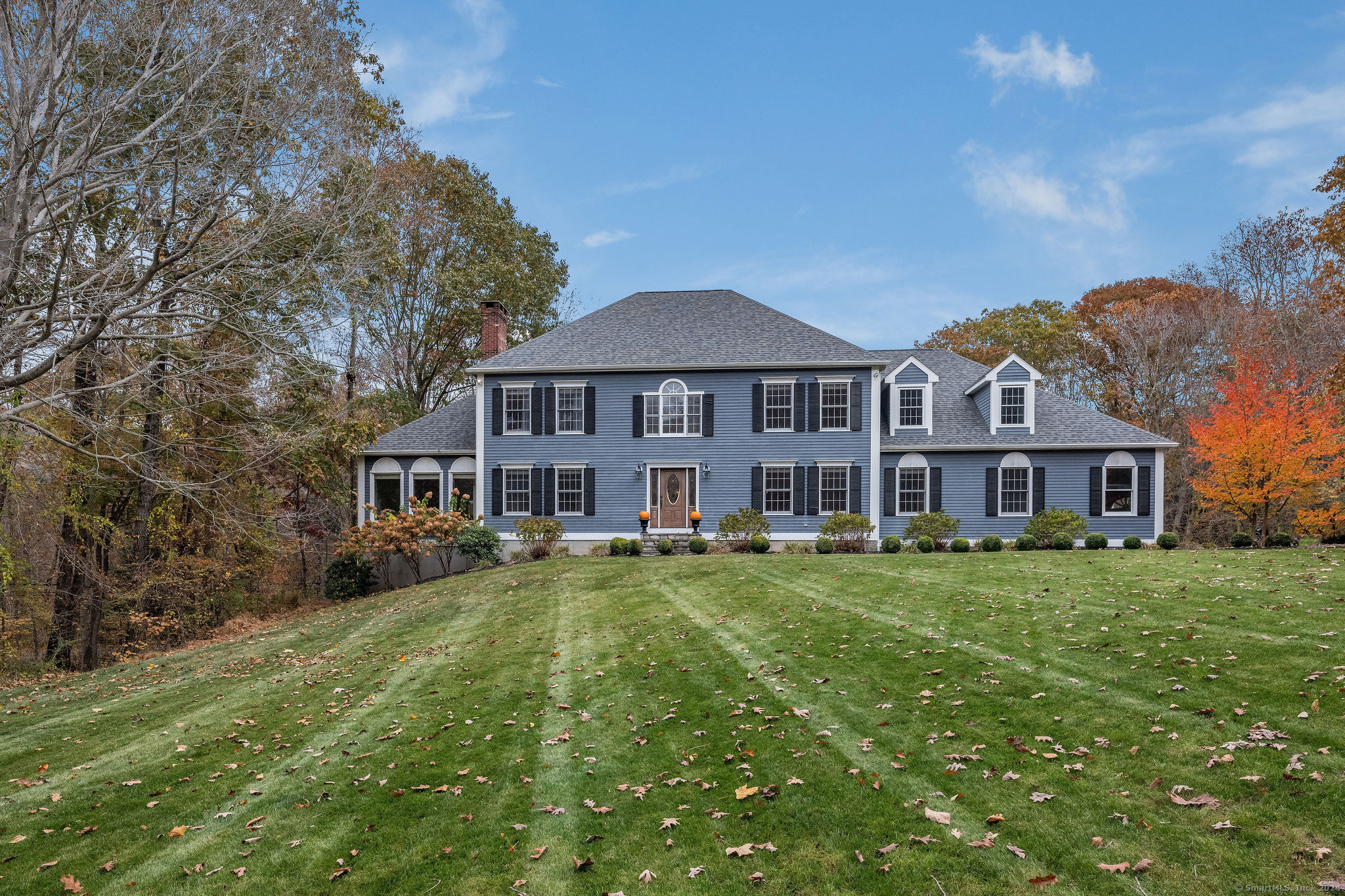 a view of a house with a big yard