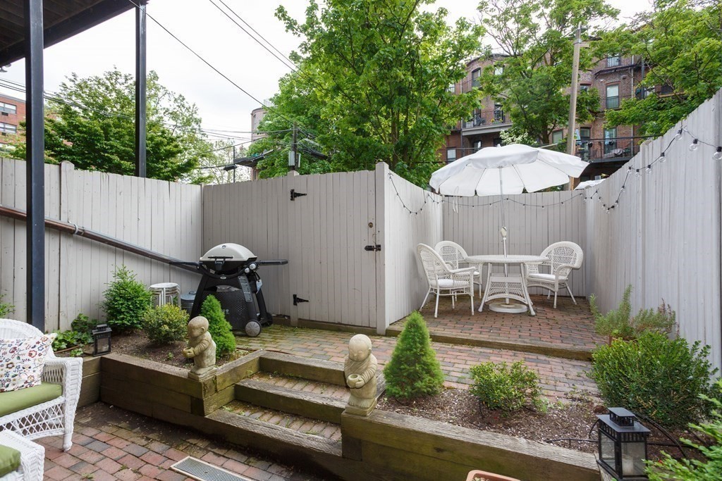 a garden view with a seating space