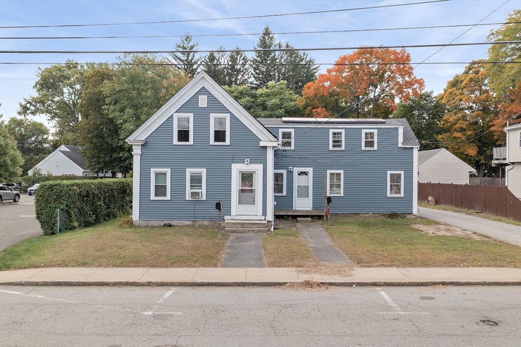 a view of a yard in front of a house