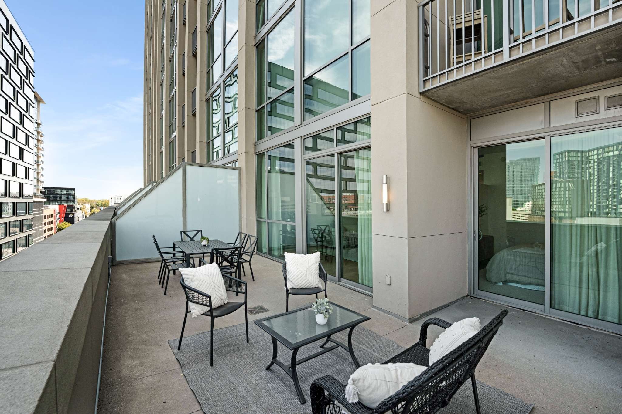 Spend time on your private terrace overlooking midtown. Entrances from the living room and the bedroom.