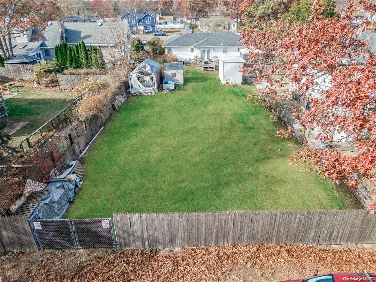 a view of a backyard with a garden