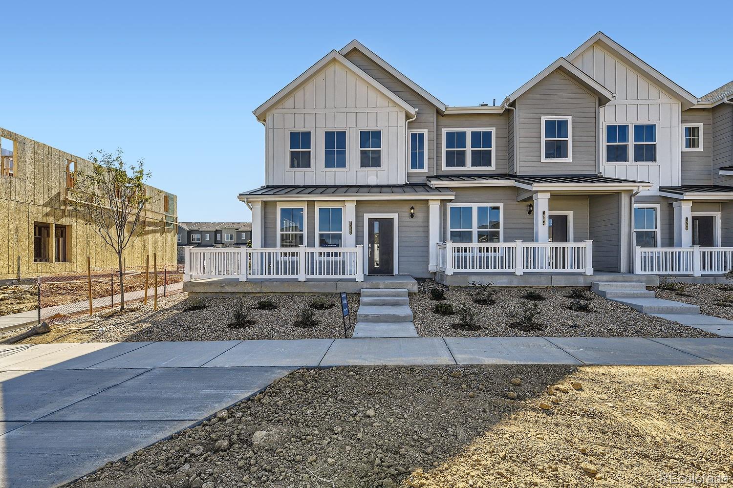 a front view of a house with yard