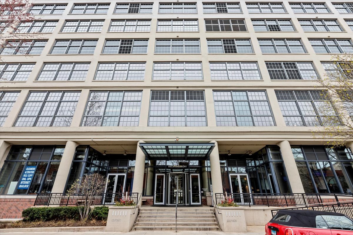 a view of a building with glass windows