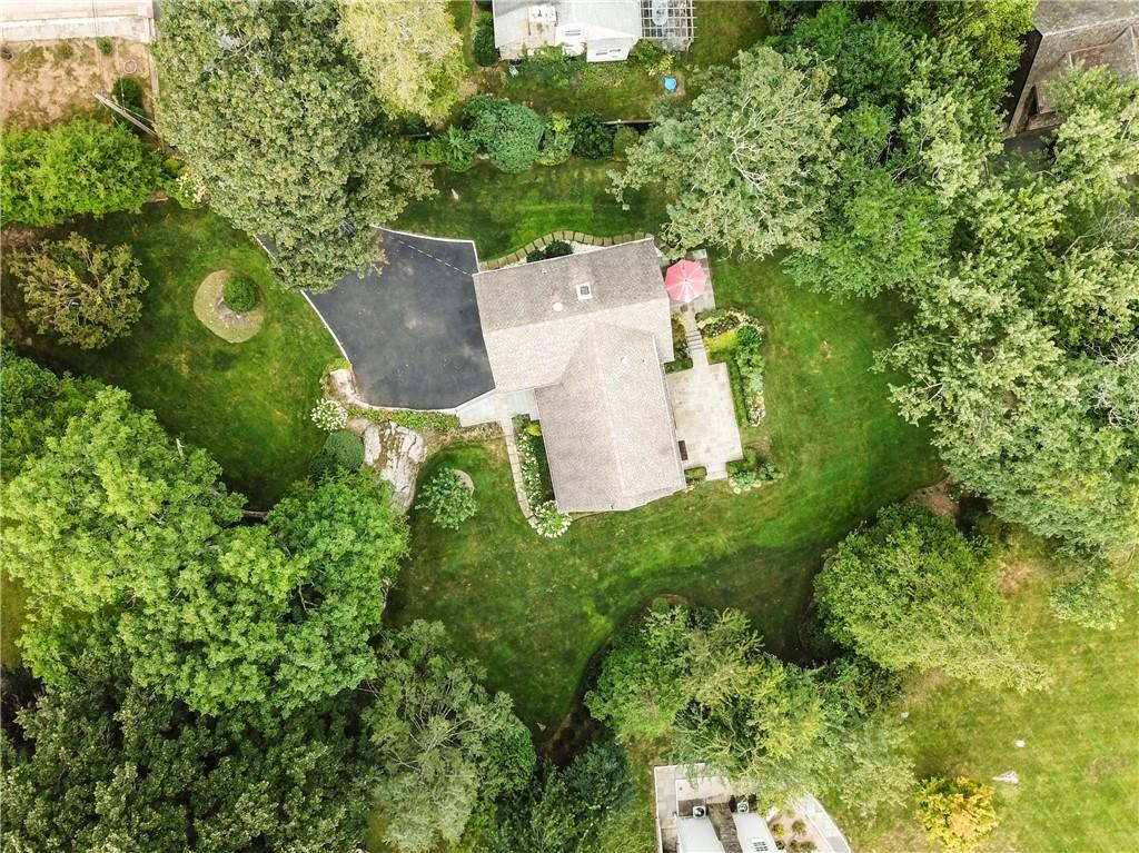 Fabulous park-like half acre property at the end of a very quiet street in the Greenville neighborhood of the Edgemont School District.