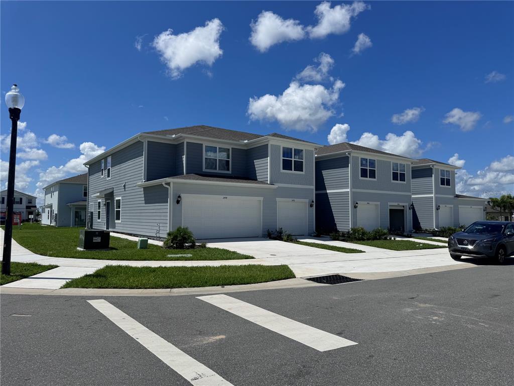 a front view of a building with yard