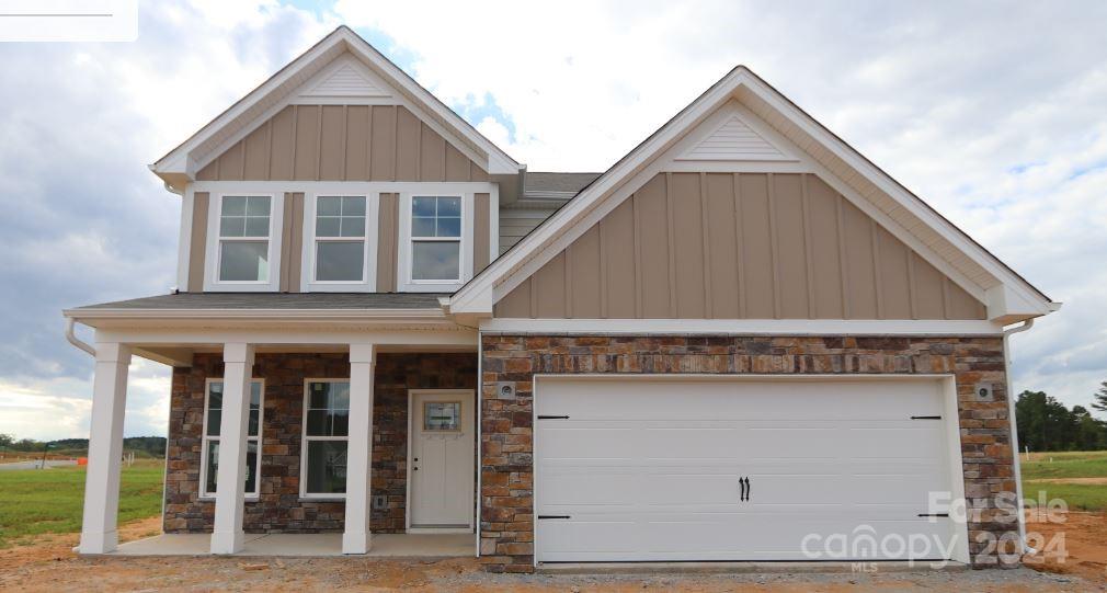 front view of a house with a small yard