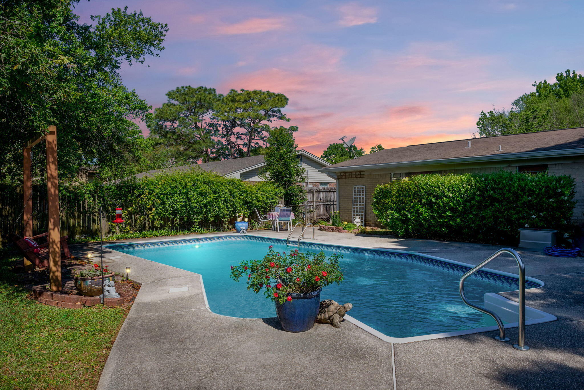 a view of a garden with patio