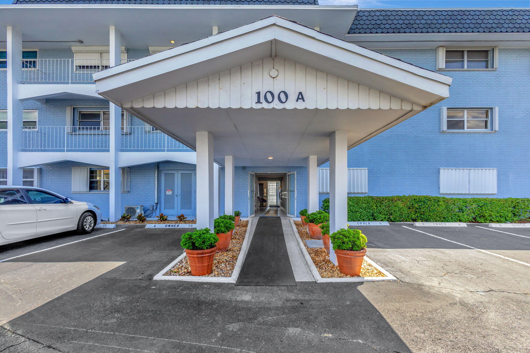 a view of a car park in front of building