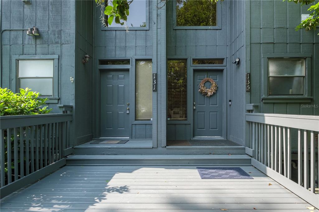 a view of livingroom entrance and an entrance door