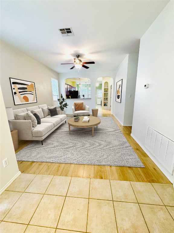 a living room with furniture and a rug