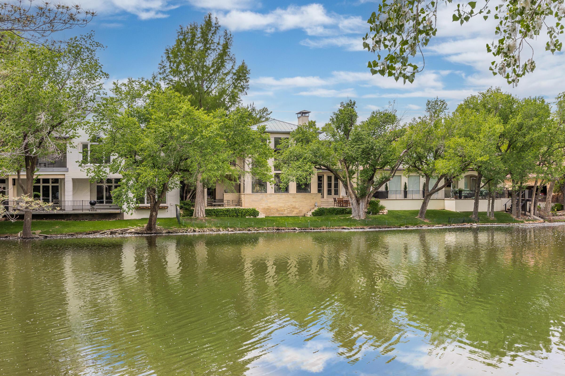 a view of a lake with houses