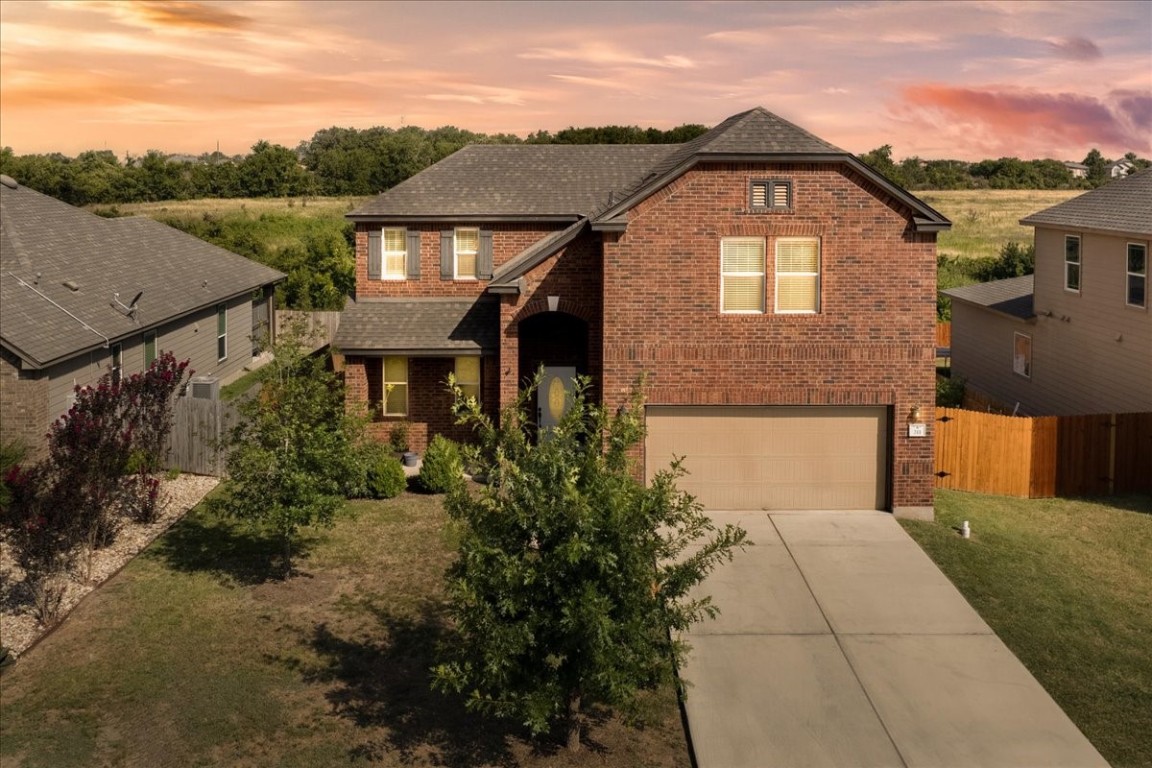 Storybook charm meets modern living. Brick beauty with endless backyard possibilities.