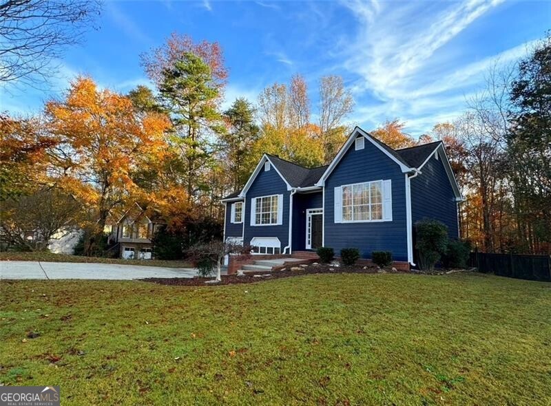 View of front facade with a front lawn