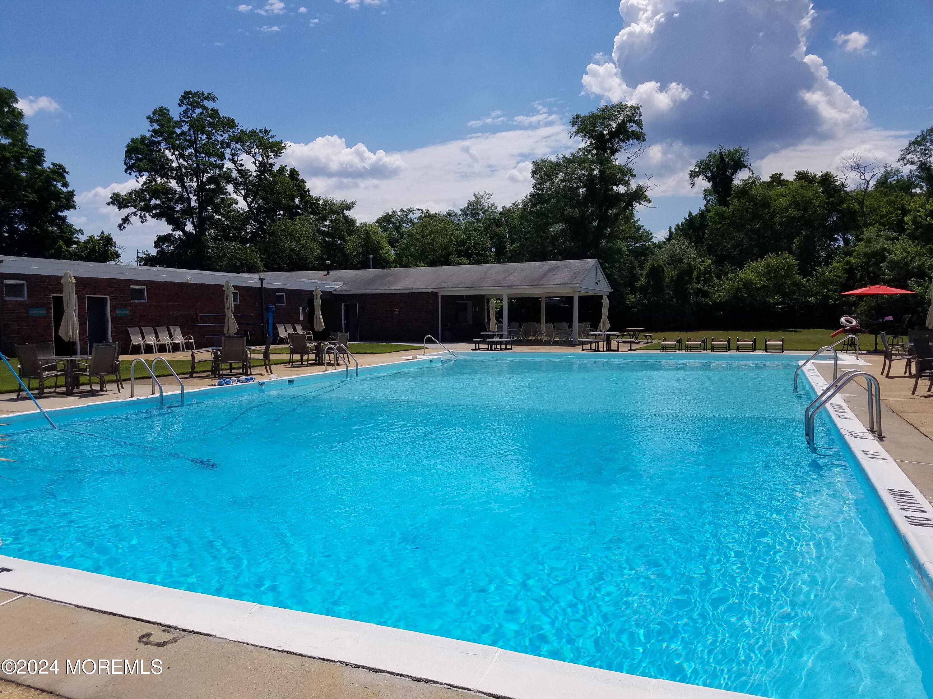 a view of a house with swimming pool