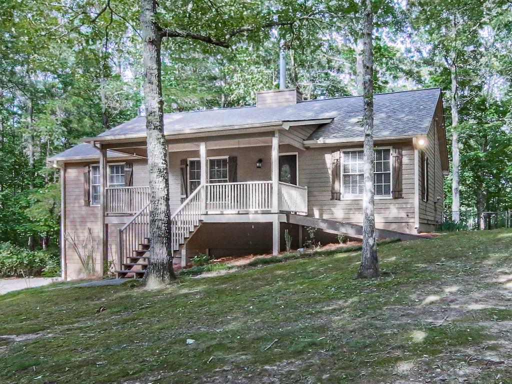 front view of a house with a yard