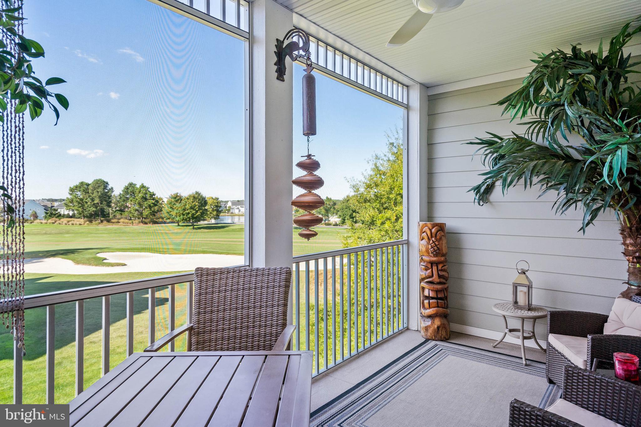 a view of a balcony with wooden floor