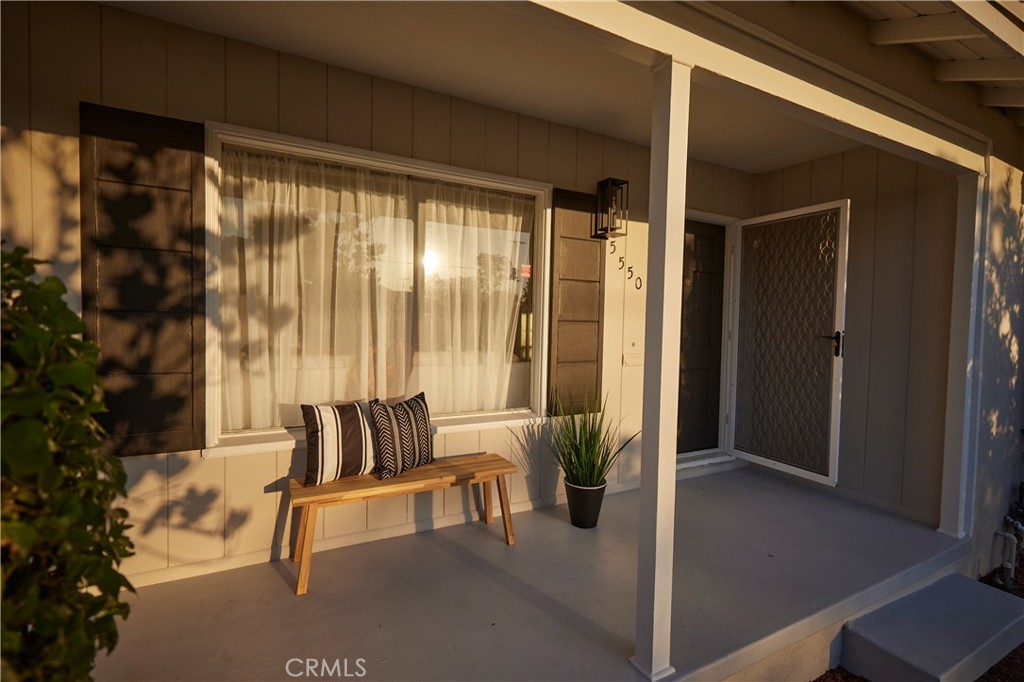 a building outdoor space with patio furniture