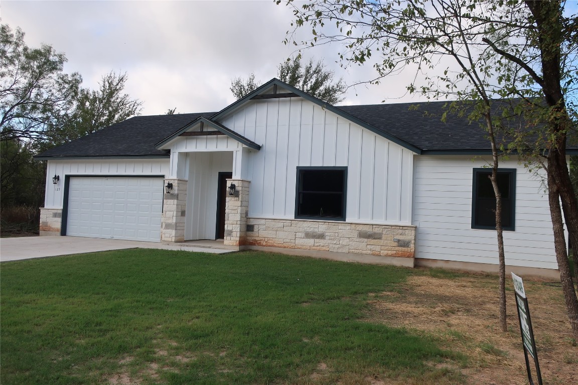 a front view of house with yard