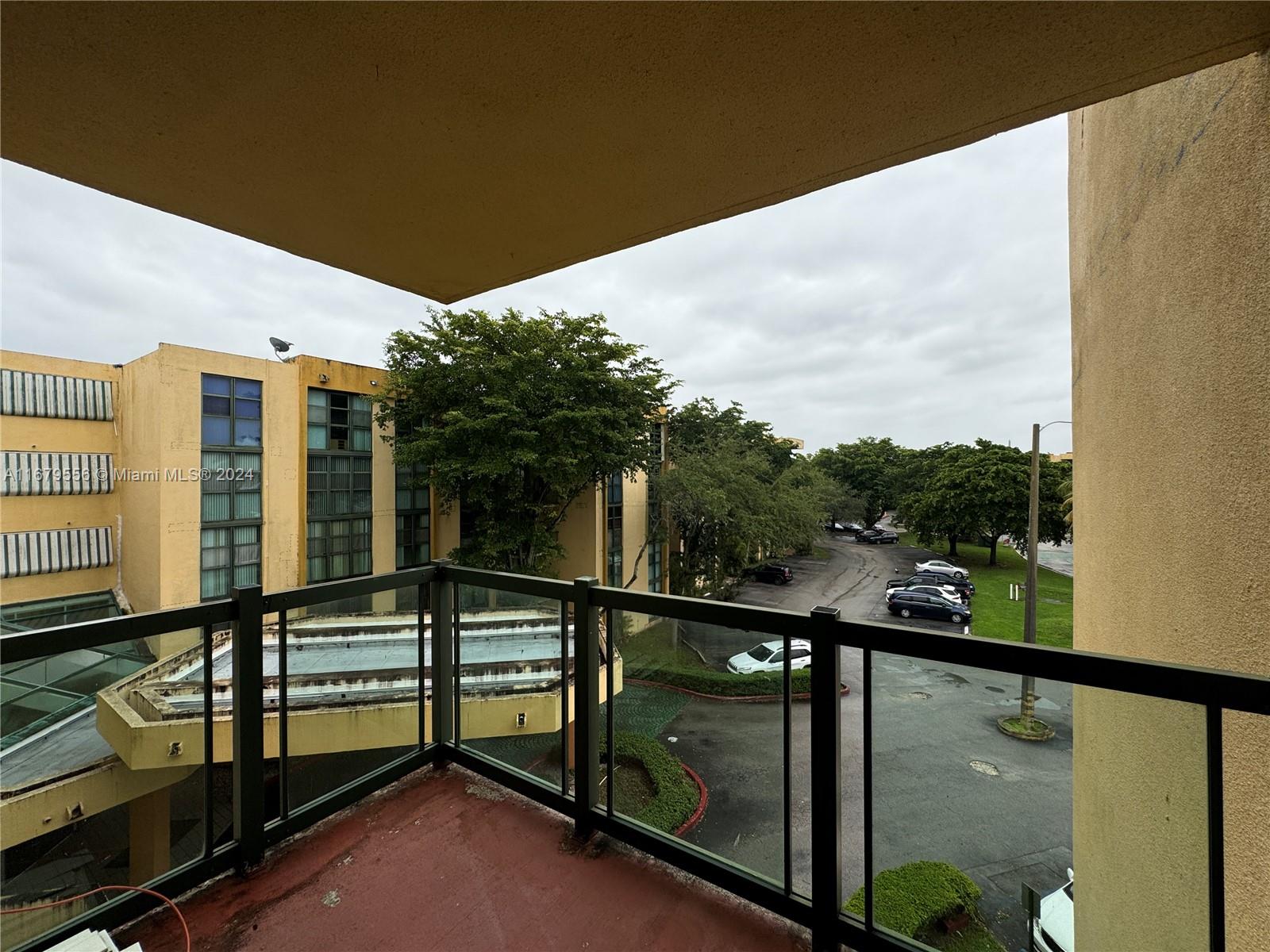 a view of balcony with two window