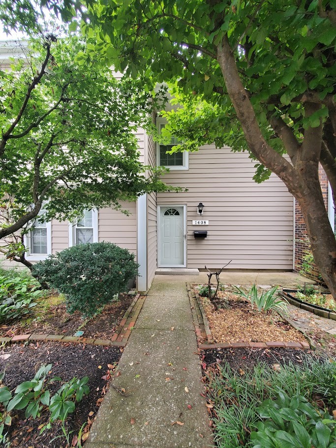 a view of a back yard of the house