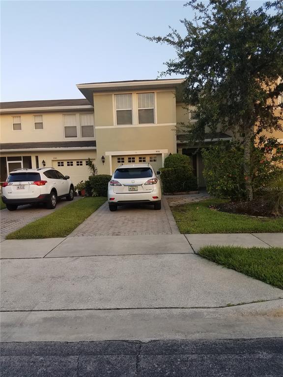 a car parked in front of a house