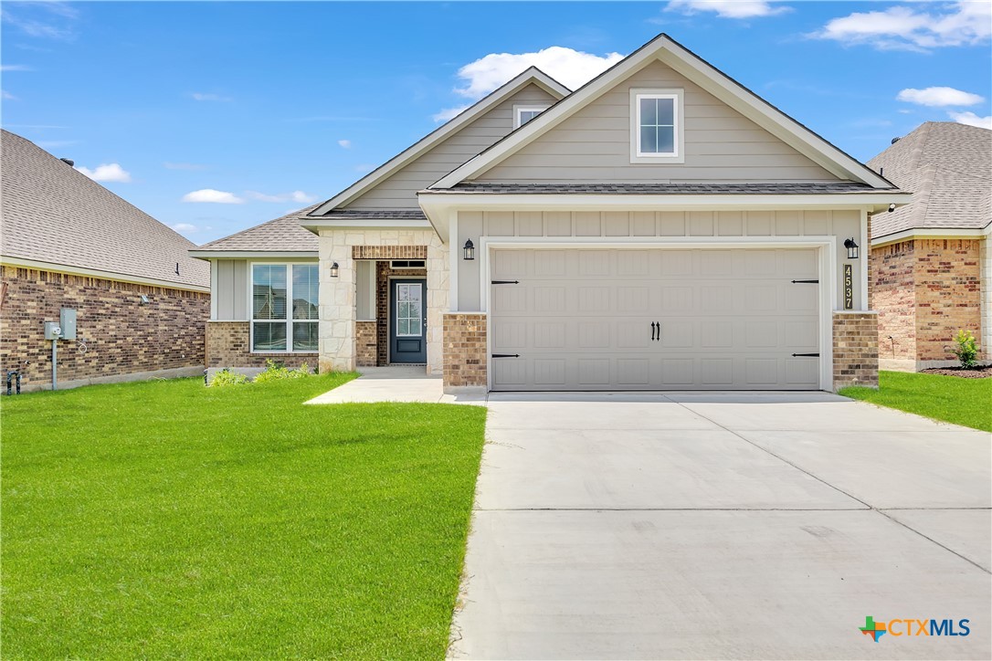 a front view of house with yard