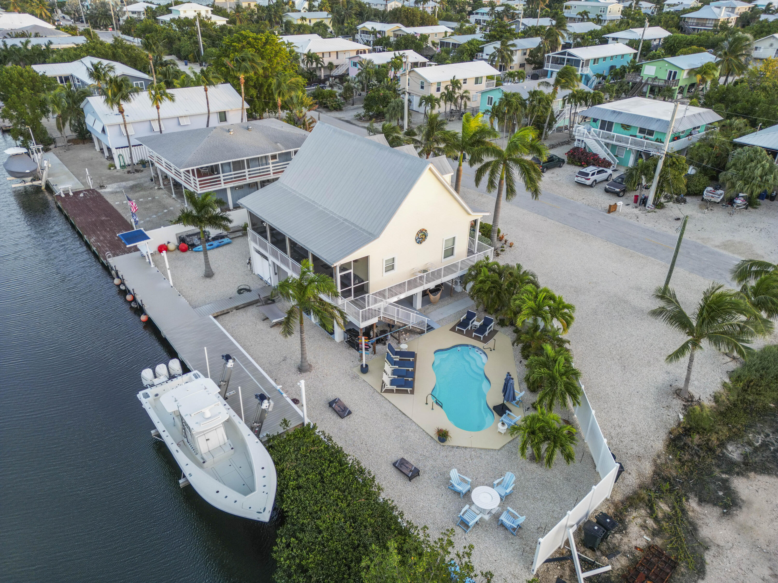 an aerial view of a house with outdoor space