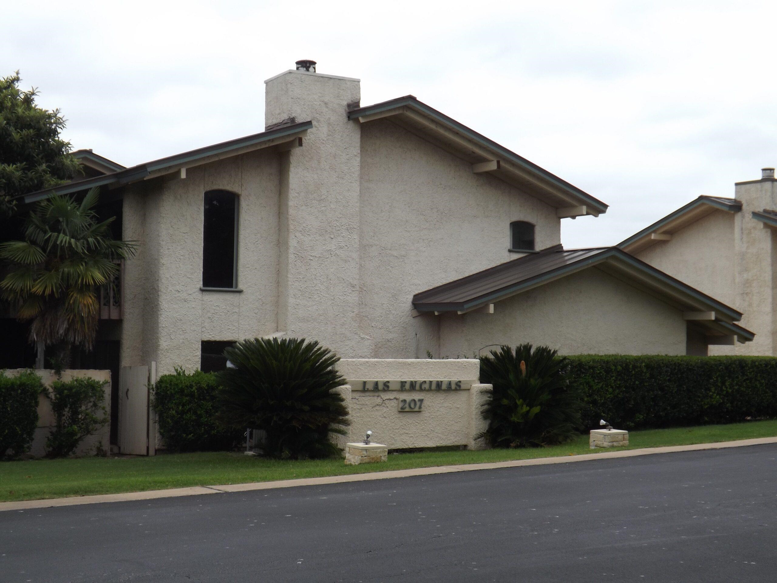 a house that has a lot of windows on it