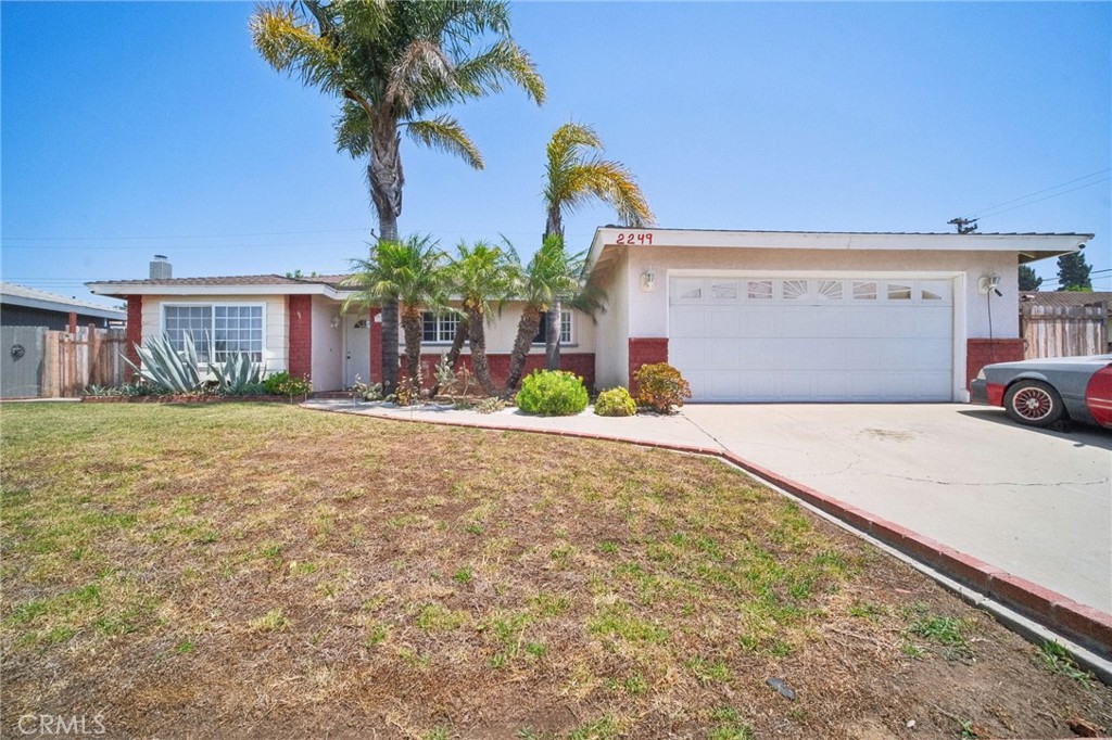 a view of a house with a garage