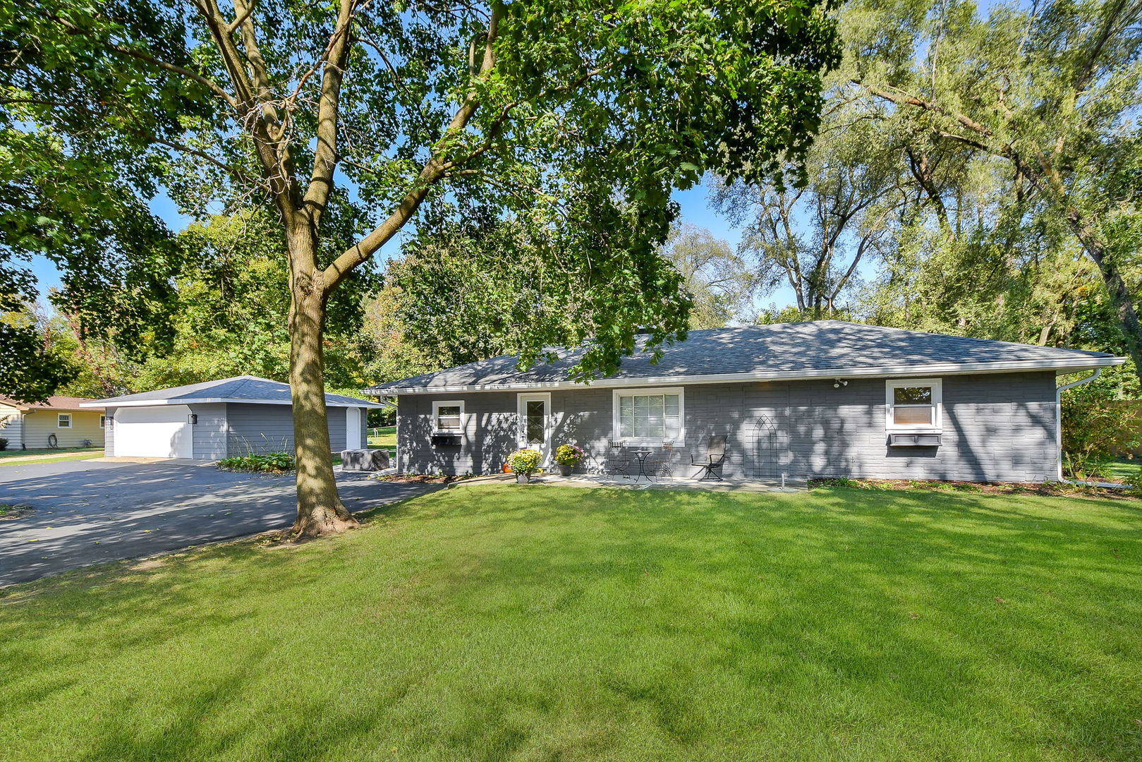 front view of a house with a yard