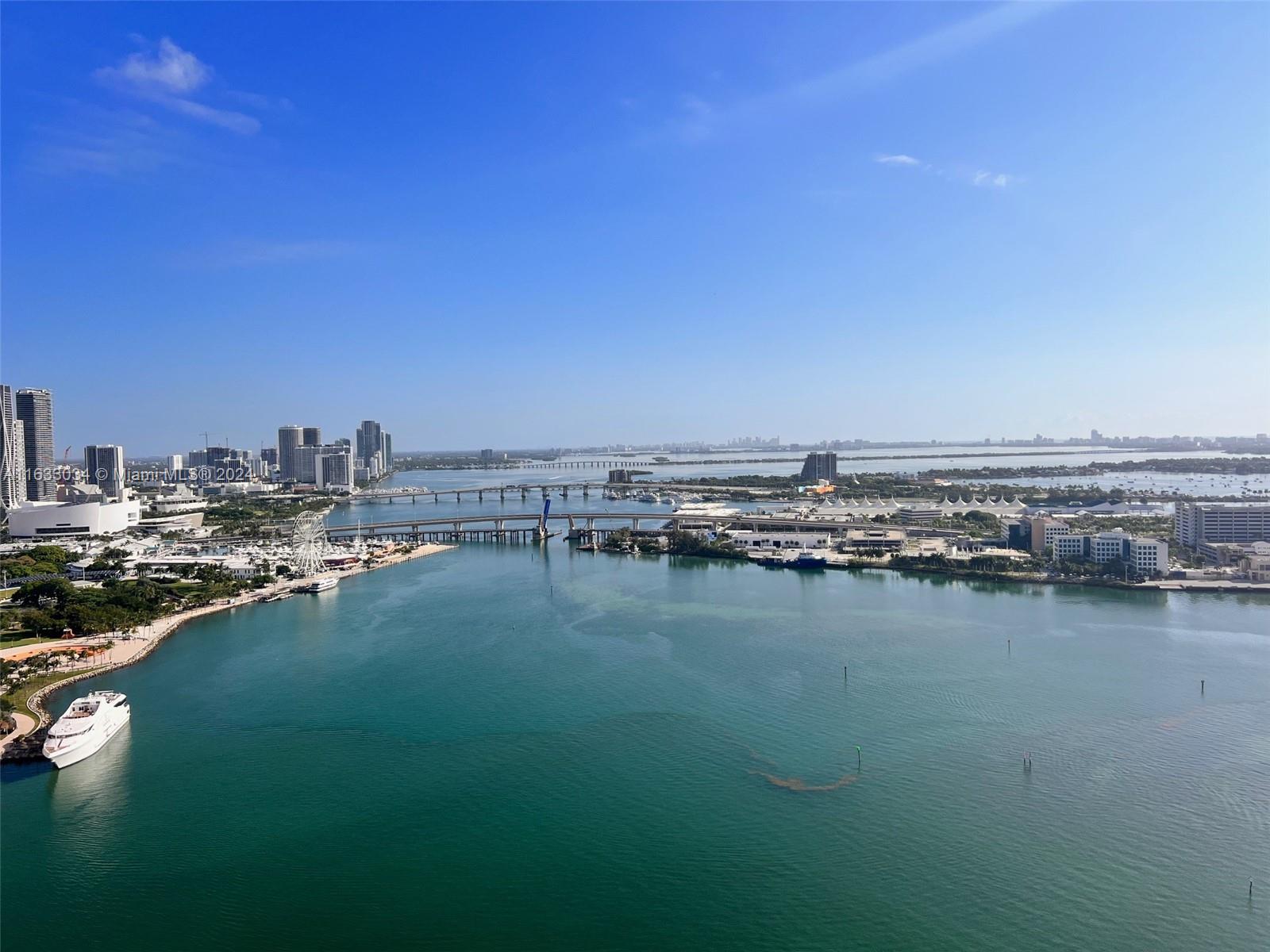 a view of a city and lake