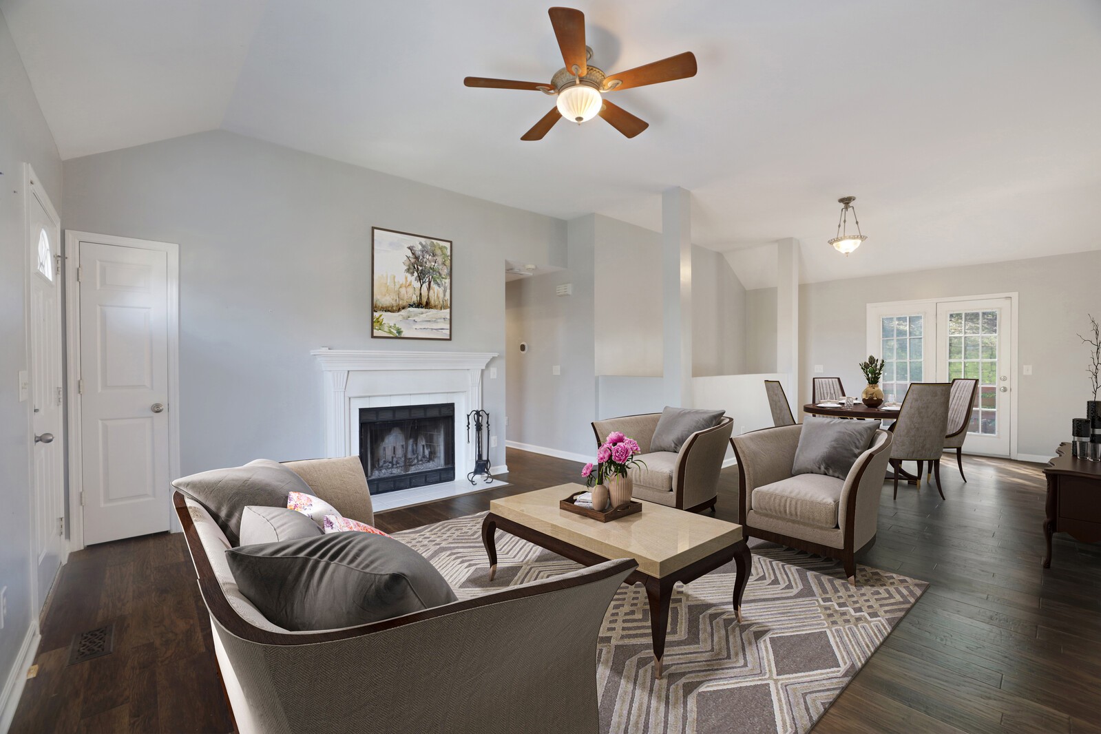 a living room with furniture and a fireplace