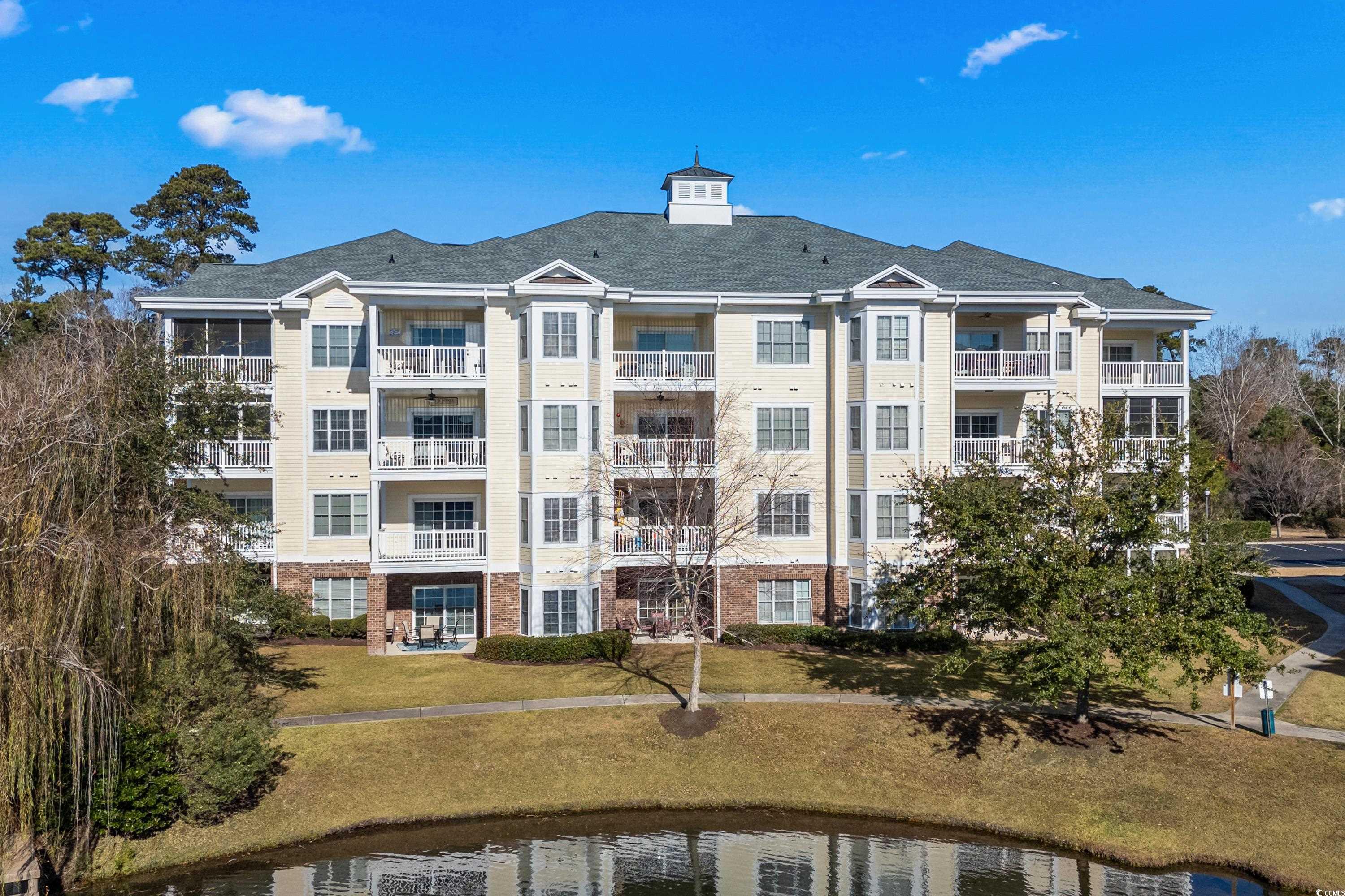 View of building exterior with a water view