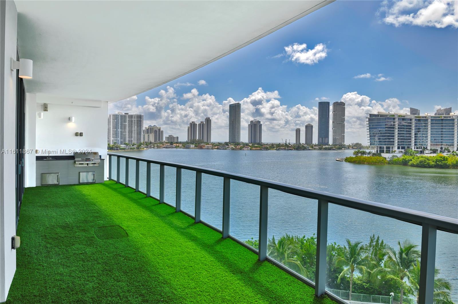 a view of a balcony with an outdoor space