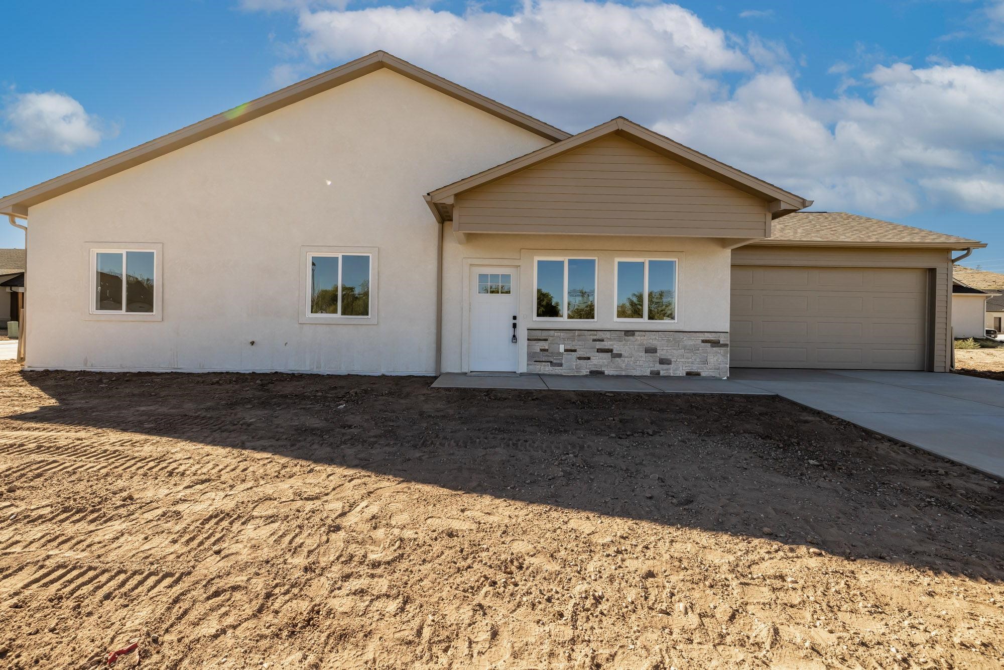 a front view of house with yard