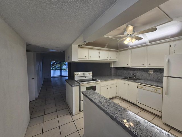 $1,849 | 7920 North Colony Circle, Unit 209 | Woodland Lakes