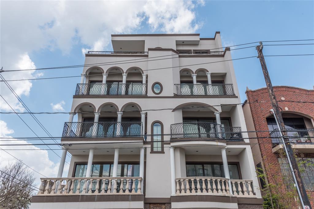 a view of a building with a balcony