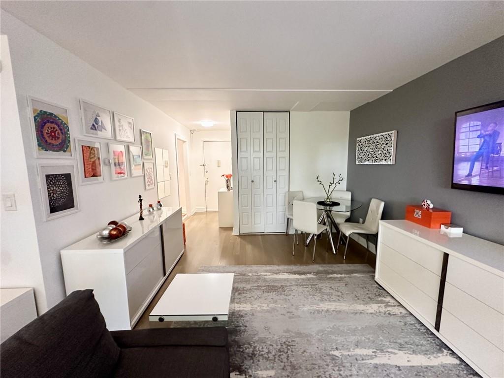 Living room featuring hardwood / wood-style flooring