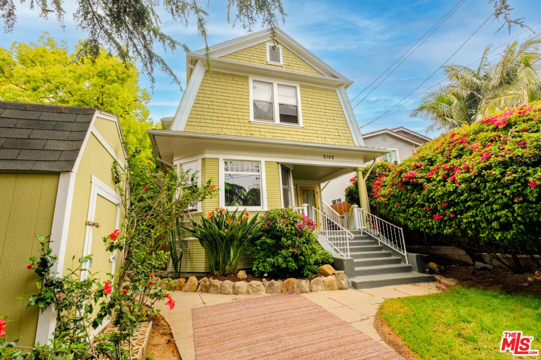 a front view of a house having yard