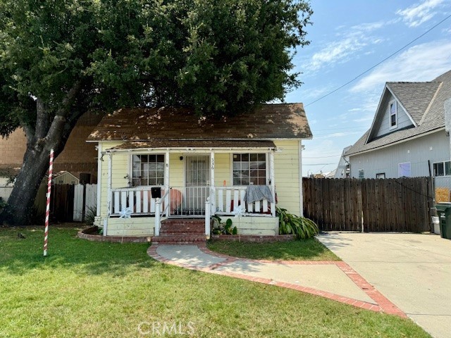 front view of a house with a yard