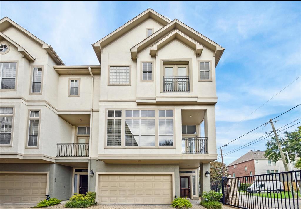 Beautiful 3 story corner TH in Rice Military located in gated community with easy access to Washington Ave., Downtown, The Galleria and The Heights.