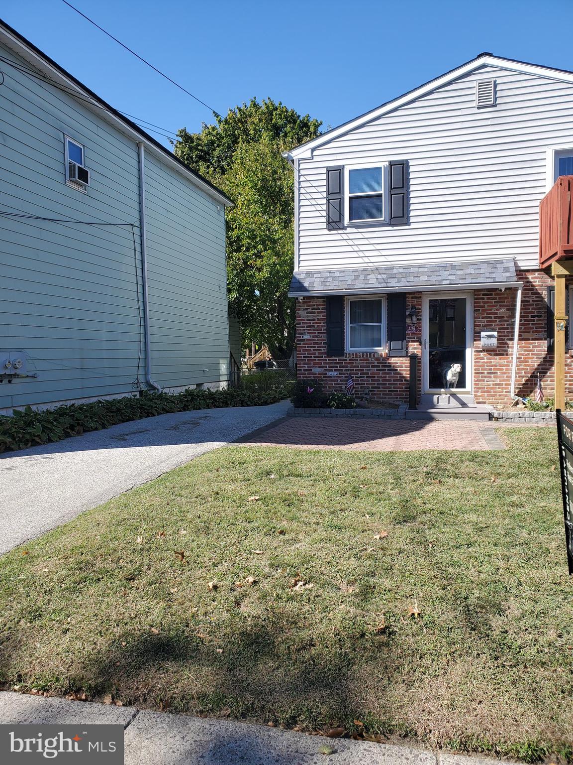 a front view of house with yard